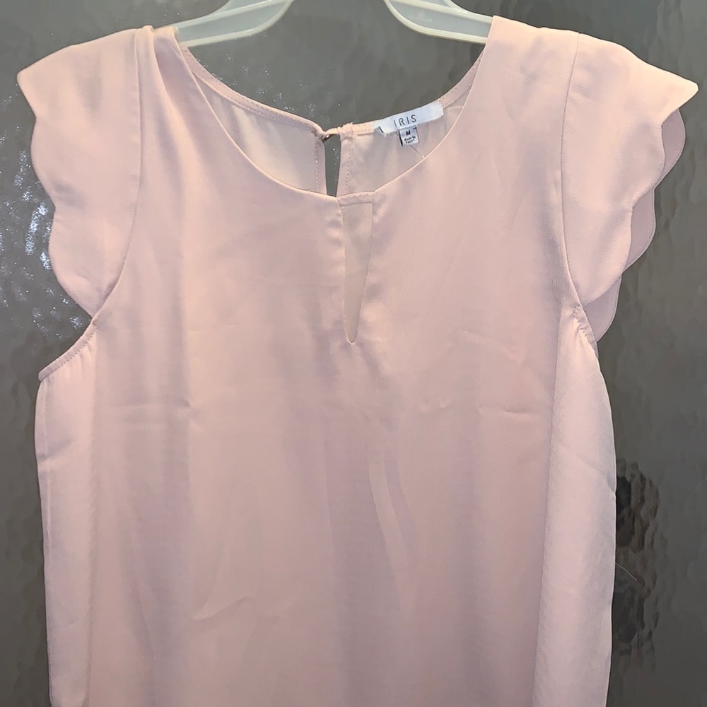 Nude sleeveless blouse